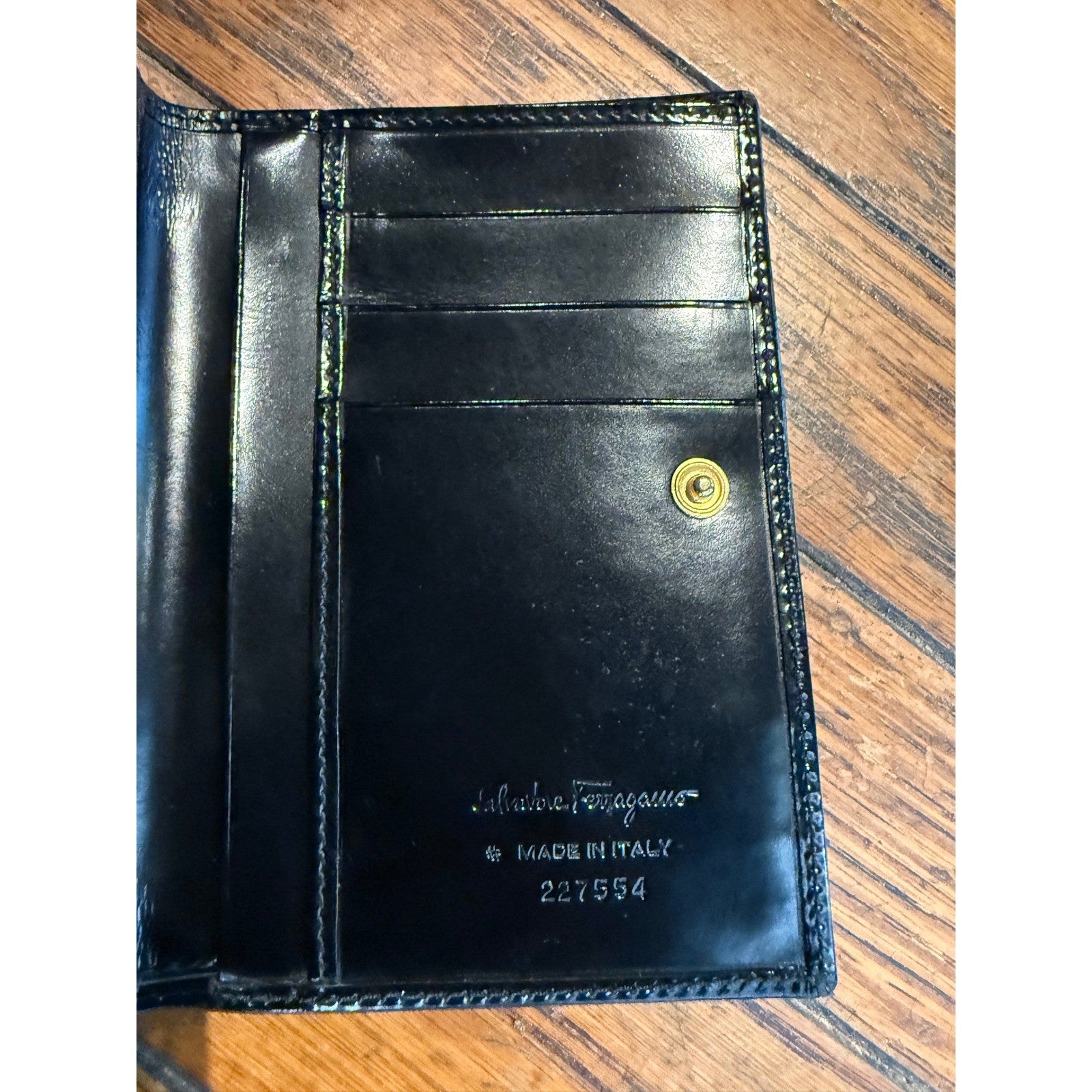 Salvatore Ferragamo Black Patent Leather Gancini Bifold Wallet 227554 Italy