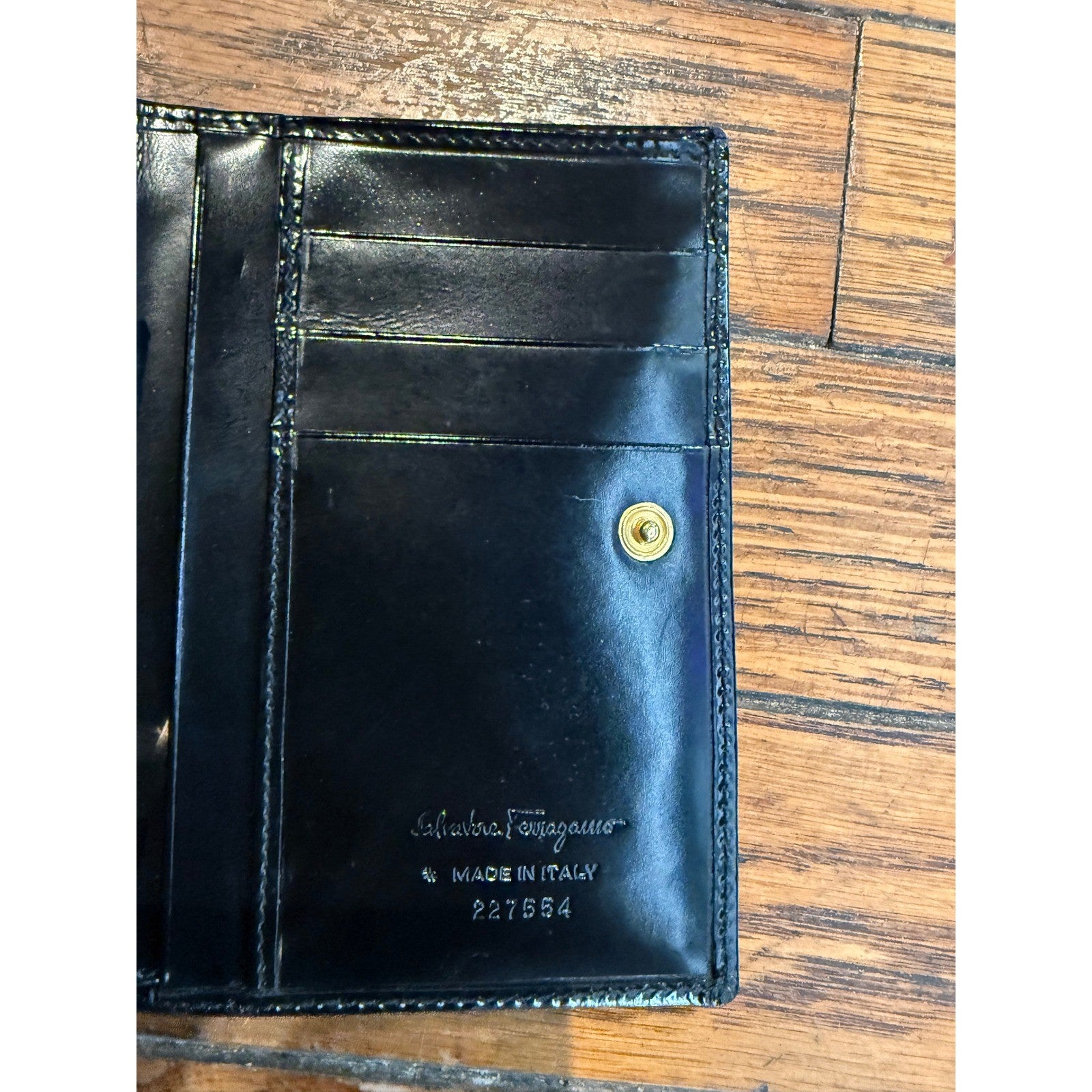 Salvatore Ferragamo Black Patent Leather Gancini Bifold Wallet 227554 Italy